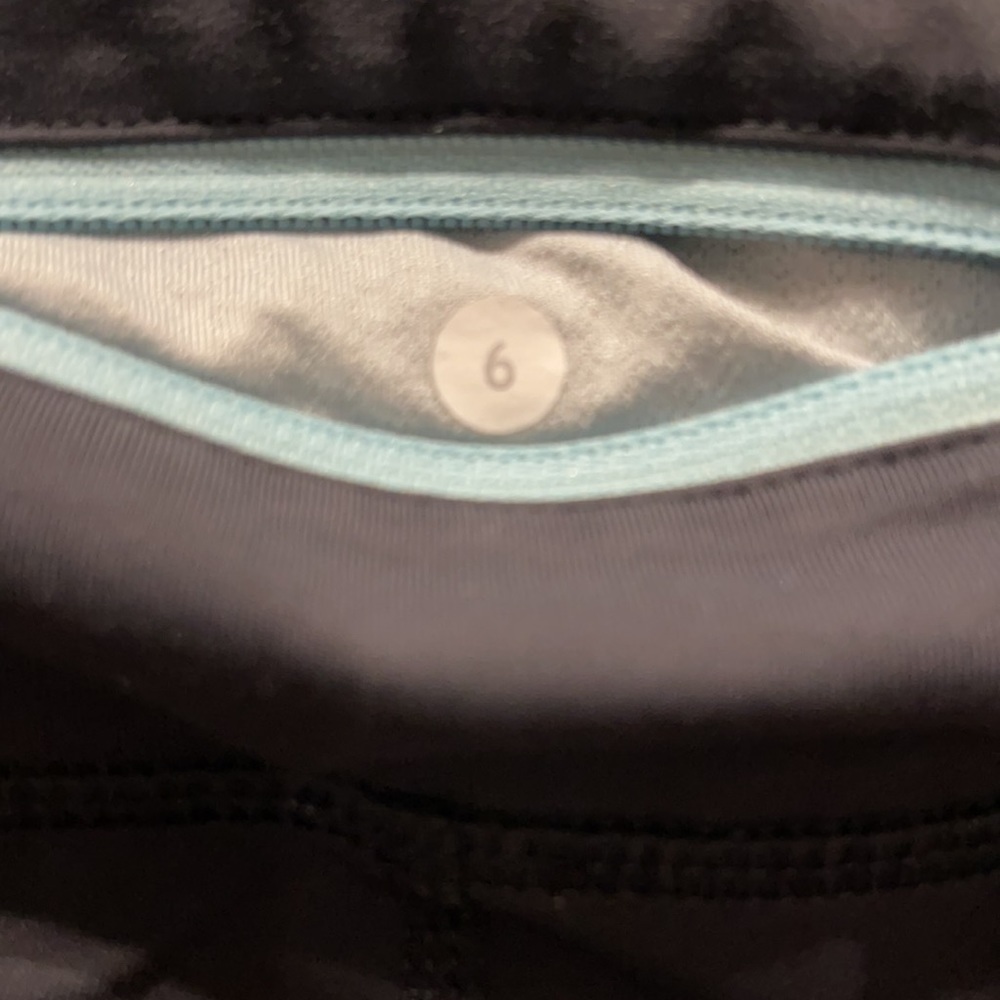 B: 𝅺Lululemon Sz 6 Run Fast and Free Crop Leggings Black Teal ruffle accent - Picture 6 of 9